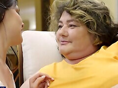 Chubby Edina enjoys while being fingered by brunette Emily F.