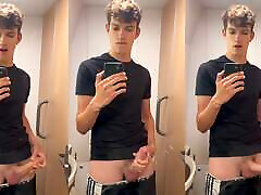 Hung twink Milo gets super horny on the train and shoots a big load