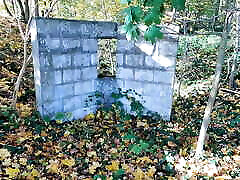 Hard titslapping behind medieval wall