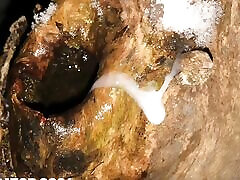 Winter masturbation in the forest with a hole in a snowy tree