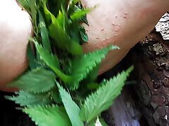 Brush and nettles inserted into the vagina