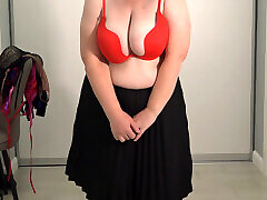 Mature wife chooses a bra for work. Big gorgeous boobs bounce and pop out of bras. Saggy tits.