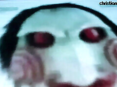Agatha Vega dressed as Saw the Riddler plays with Christian