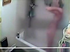 Voyeur tapes a male female kissing skinny girl showering