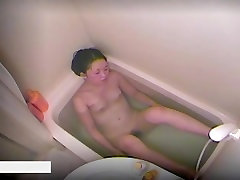 phone exchanges babe taking a bath and shot by a hidden cam