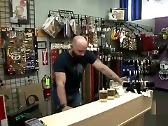 Muscle bear goes to adult shop