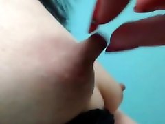 Close up big nipple pulling