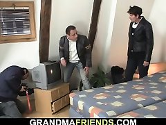 Two men film 3some with 60 yo granny in lingerie