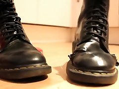 Girl wiggles her toes in soft, well worn aunt pooja sex Martens and crushes a toy car