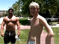 Buff guy gets a public blowjob