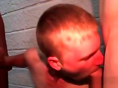 Fresher blows two cocks in gay gangbang