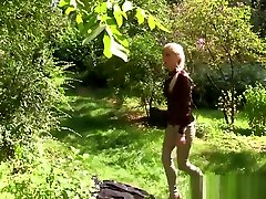 Babe gargles piss outside