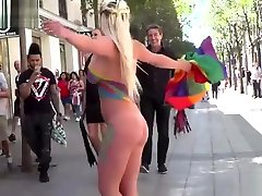 Naked body painted blonde in public