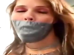 Girlfriend contends with massive tape gag