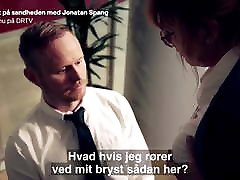 Danish mature Ditte Hansen pretends to lick nipple in skit