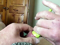 Stretch foreskin session - rubber toy