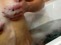 PRETTY WOMAN TAKES A BATH AND CARESSES HER PUSSY TO ORGASM