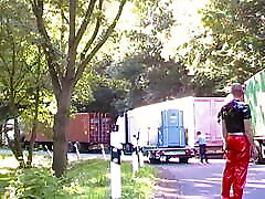 Dressed up in latex on the public track stop