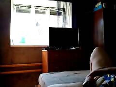 Milf fucks herself for window cleaner
