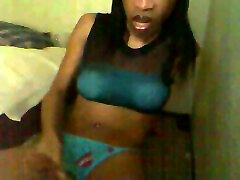Ebony shemale with huge BBC jacks off and cums on webcam
